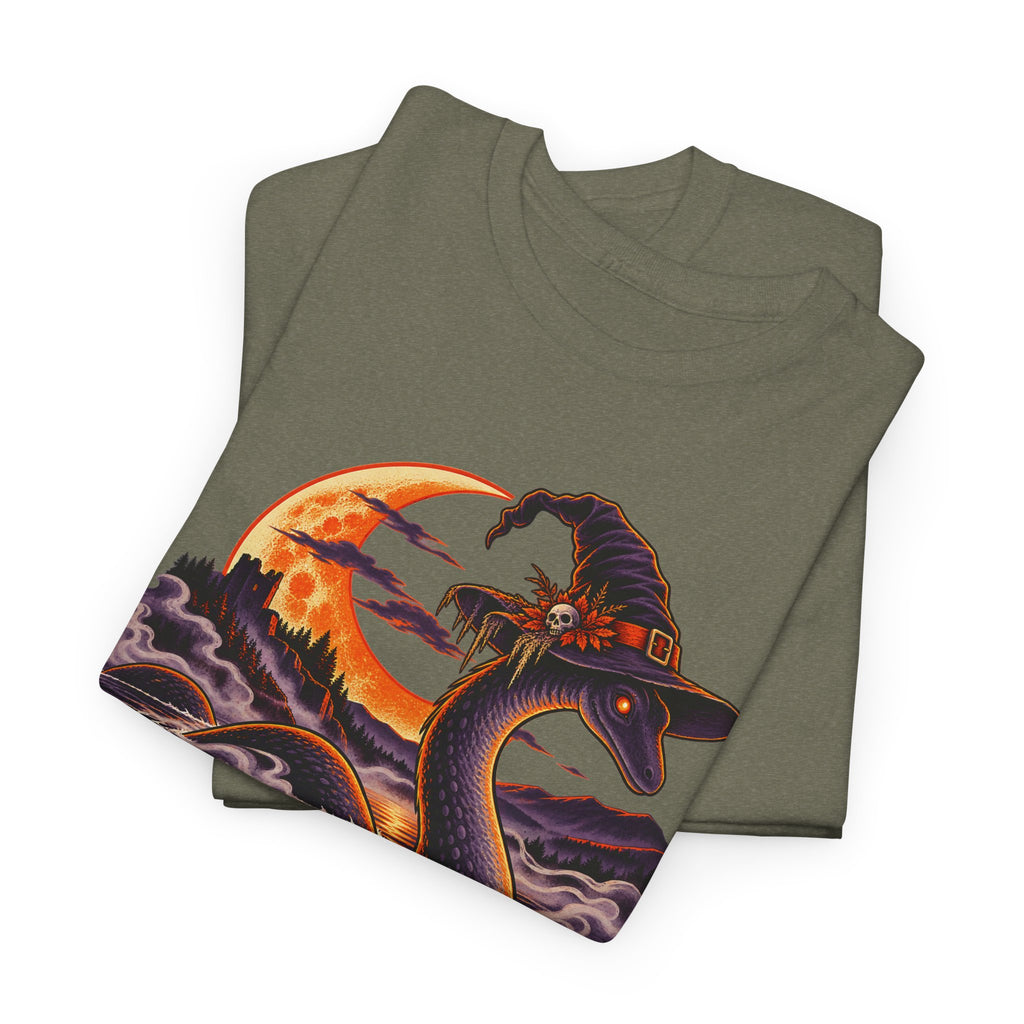 Olive green crewneck t-shirt with colorful cryptid-and-witch graphic on the front.