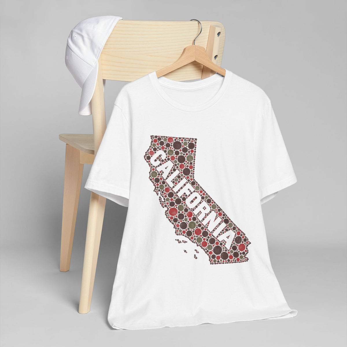 White short-sleeve T-shirt with red floral dot California outline graphic