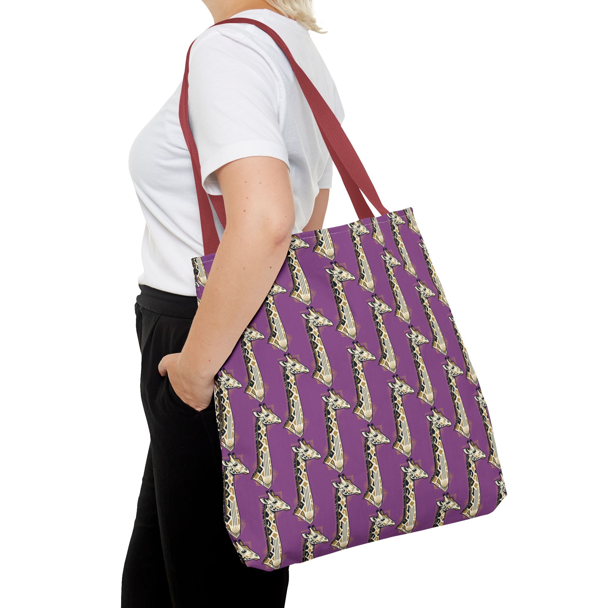 Purple saxophone patterned tote bag carried on shoulder with burgundy strap