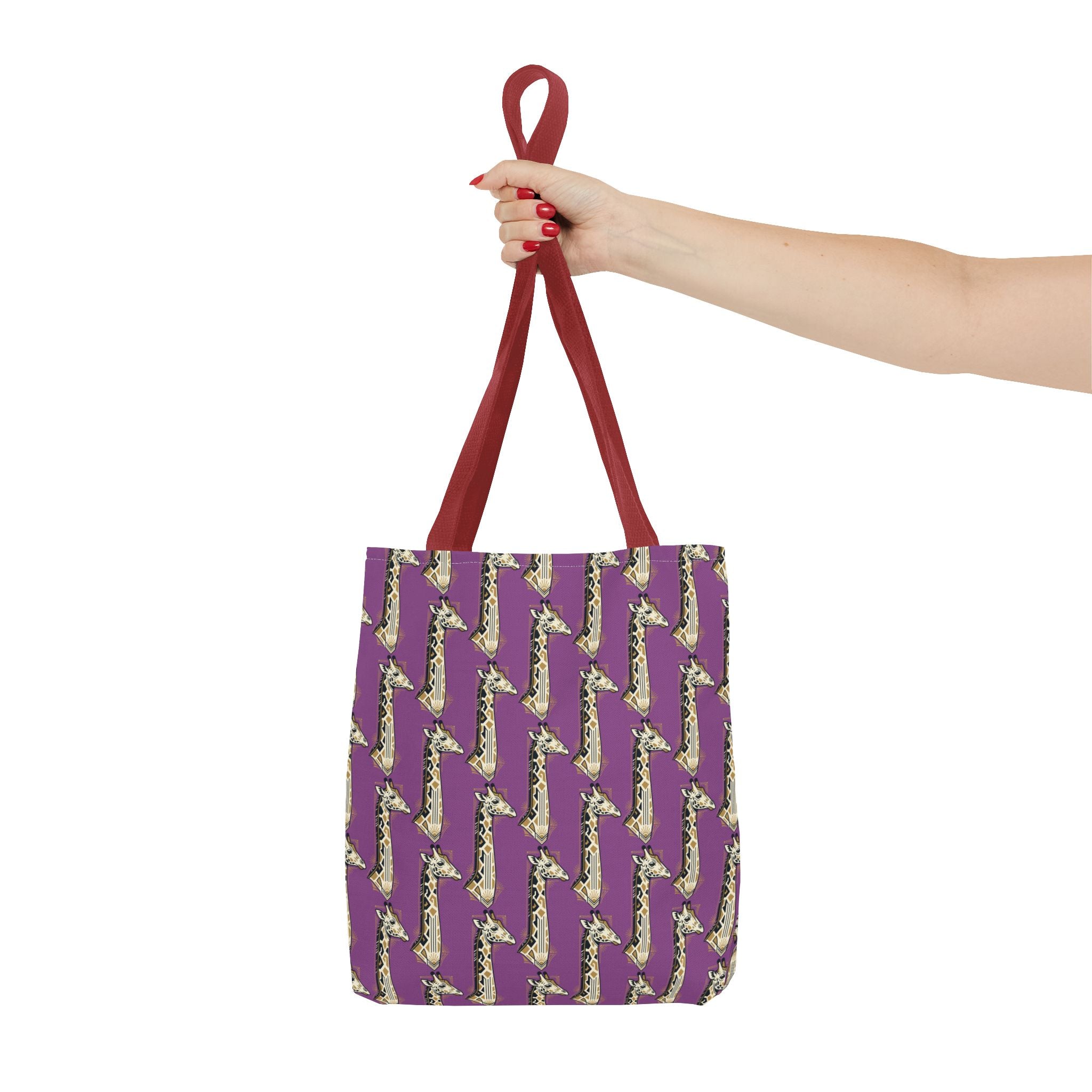 Purple tote bag with saxophone pattern, red top handles.