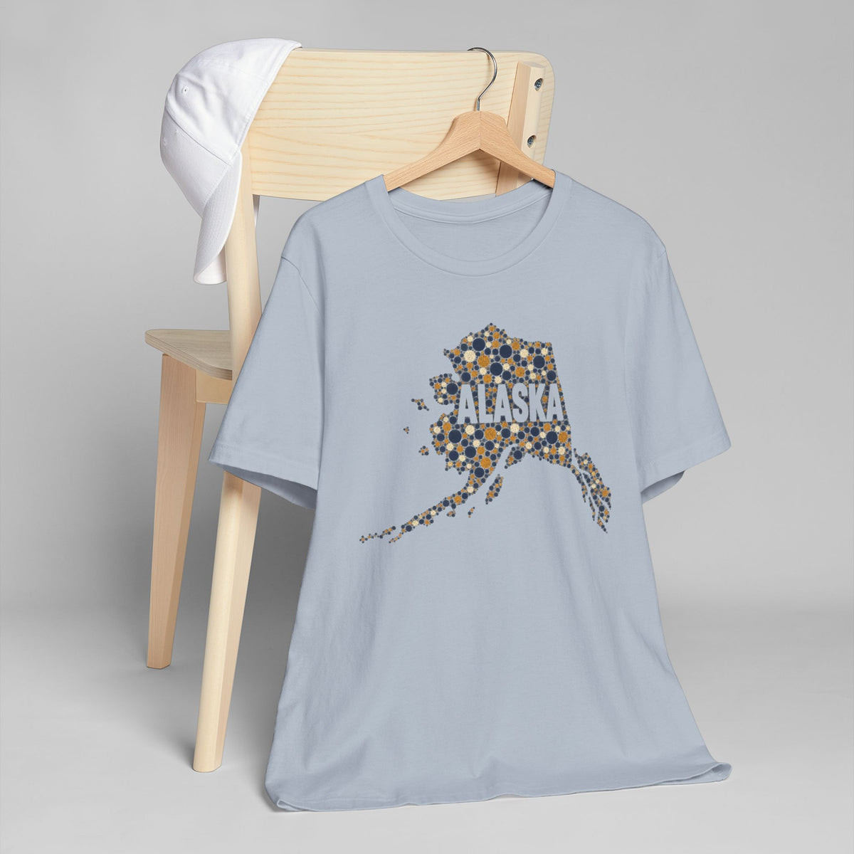 Light blue crew-neck T-shirt with dotted Alaska state graphic on the front