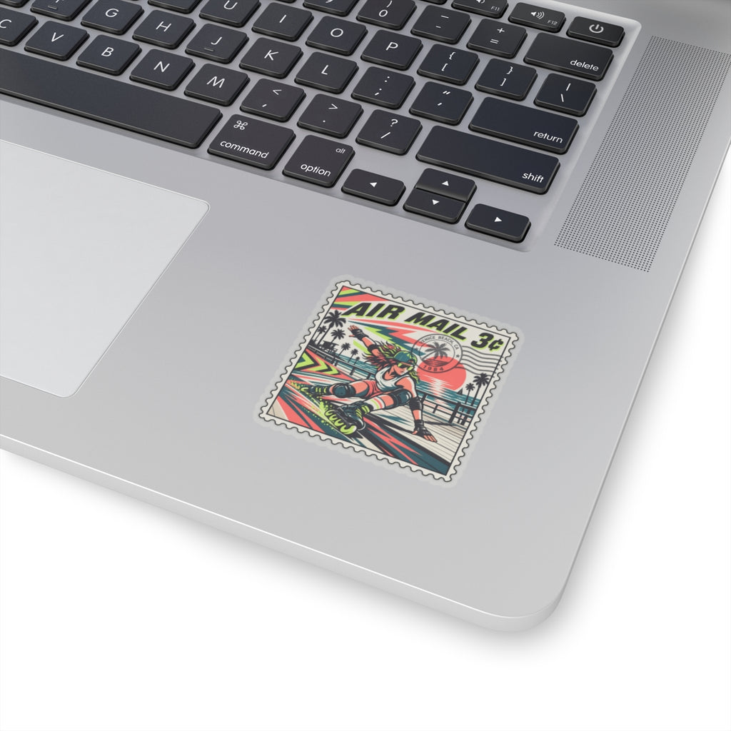 Air mail 3c stamp-style vinyl sticker on laptop trackpad, 'AIR MAIL 3c' text visible
