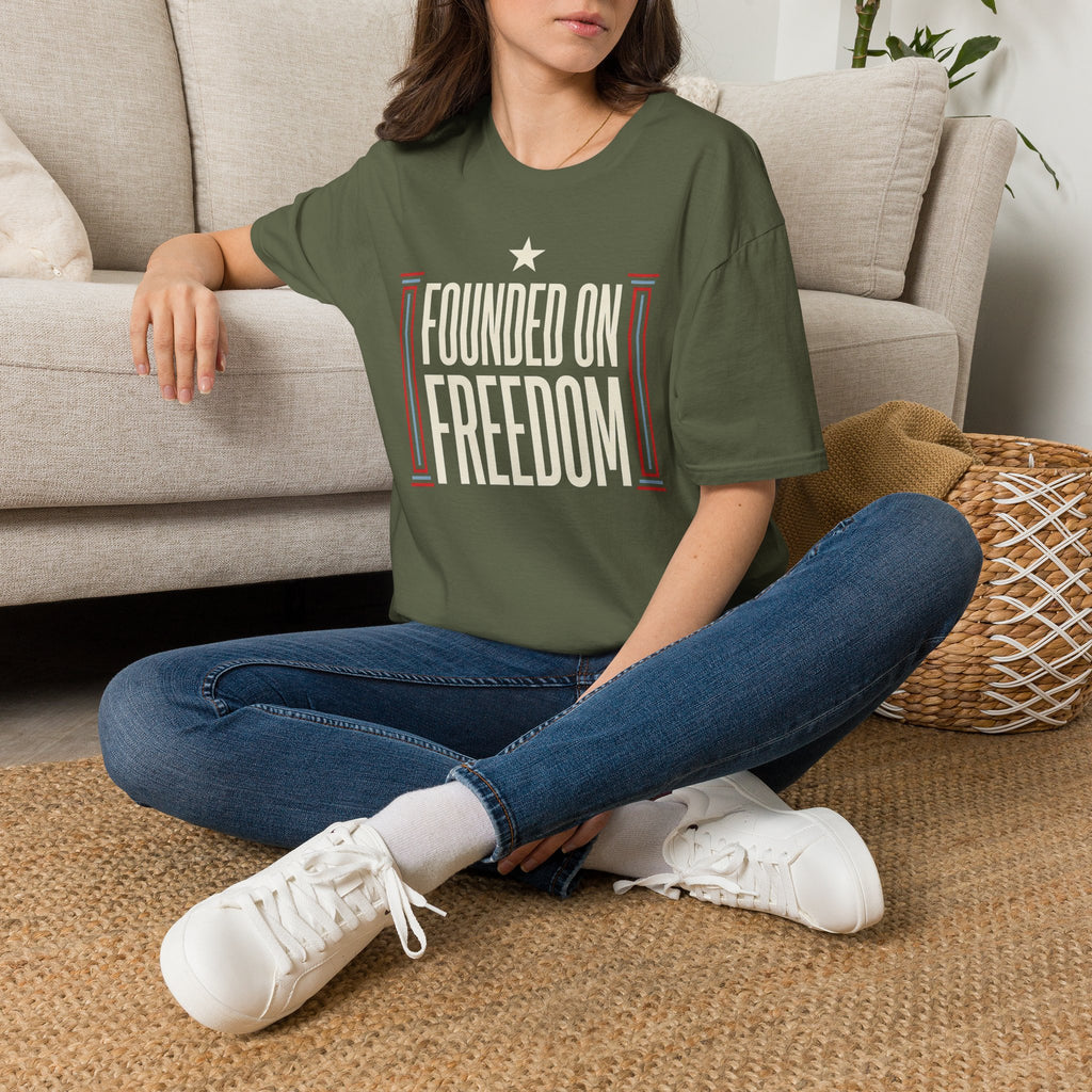 Military green short-sleeve t-shirt with white star and "Founded on Freedom" graphic