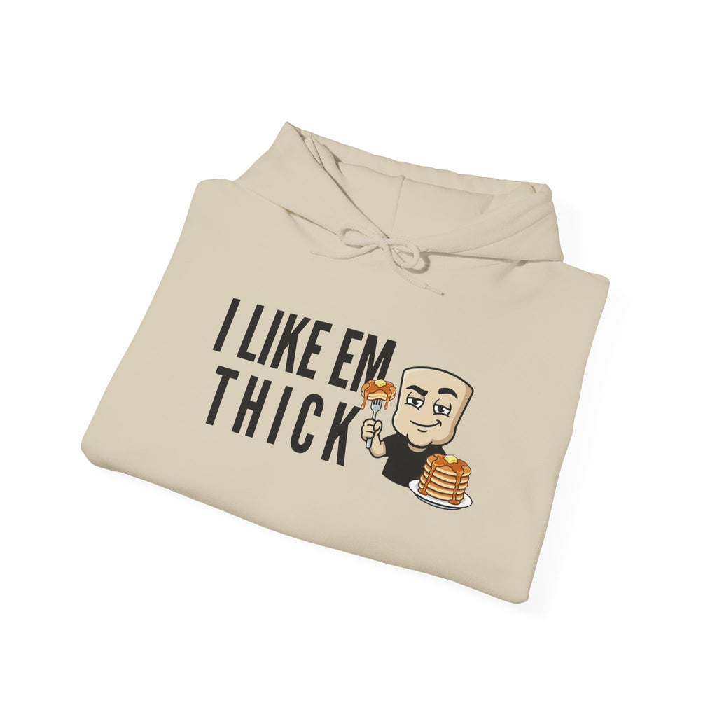 Light beige hoodie folded with front cartoon text graphic and pancake stack