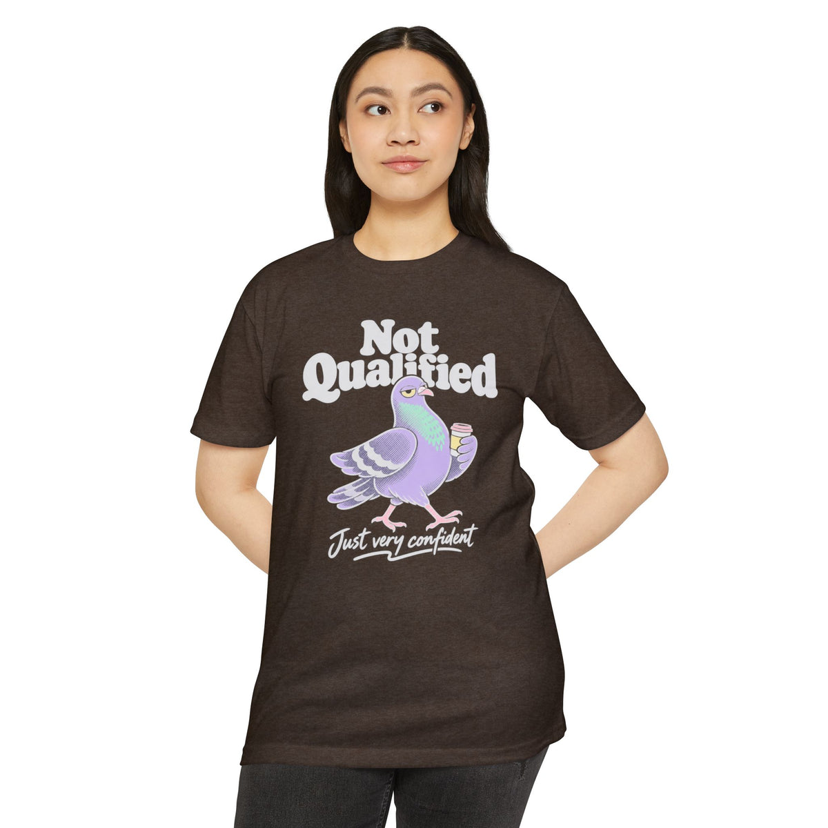 Brown crewneck T-shirt with pigeon graphic and 'Not Qualified' slogan on front