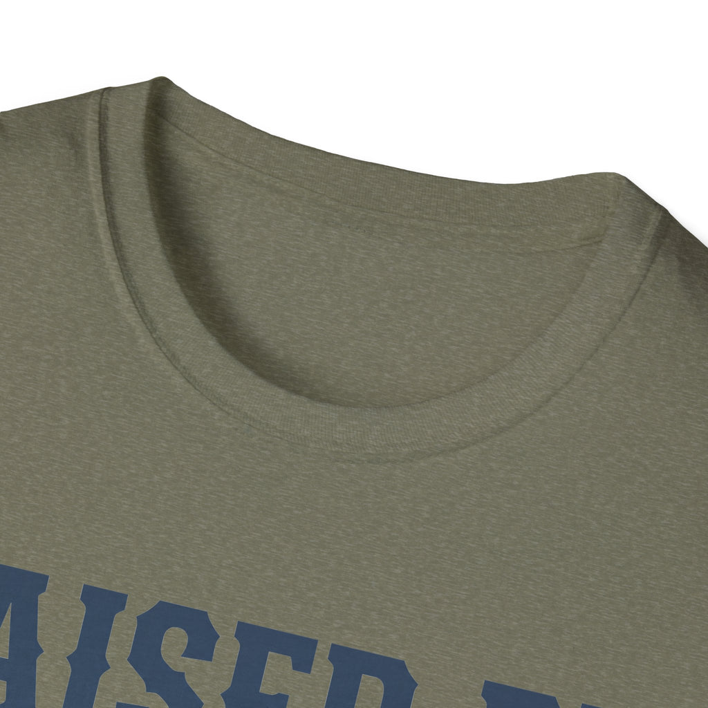 Military green crewneck T-shirt close-up with partial text graphic.