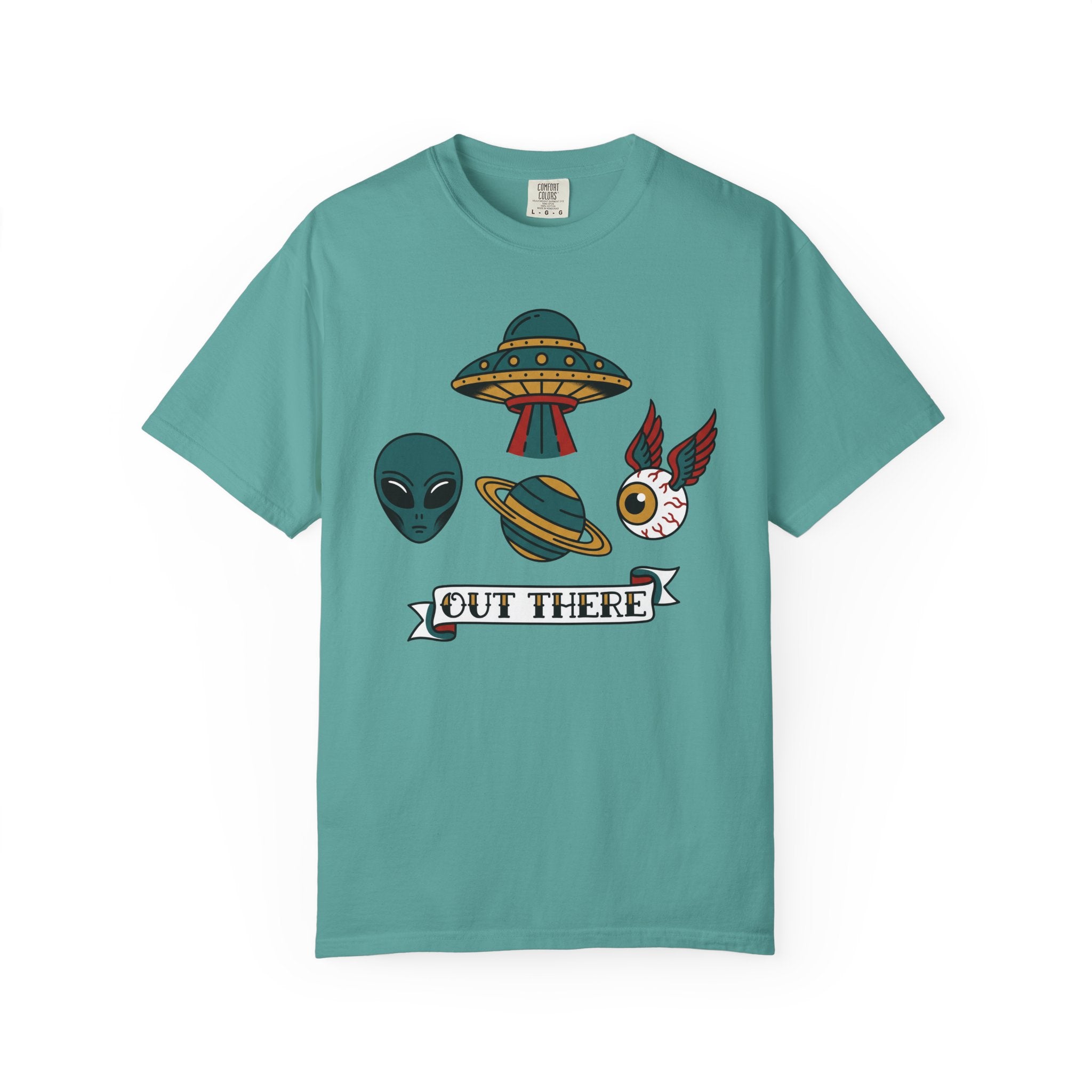 Teal graphic T-shirt with alien, UFO, and "OUT THERE" patch-style print